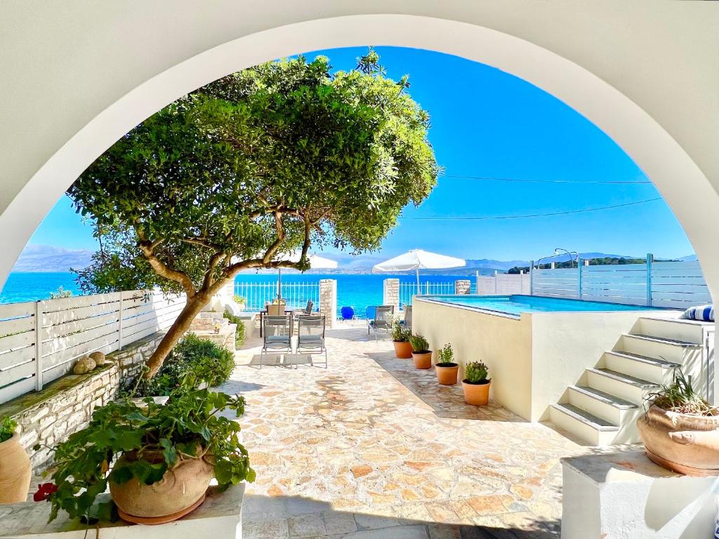Beachfront House Christina with private heatable pool by DadoVillas